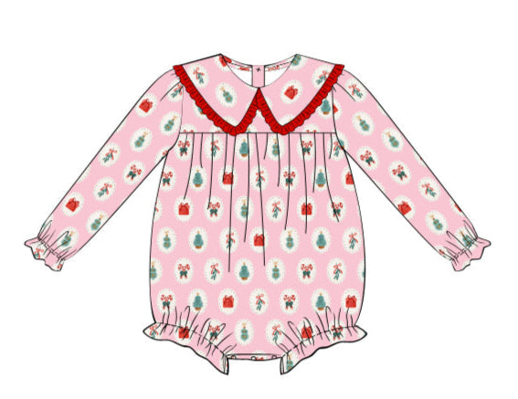 Children's pink dress with floral pattern and red collar on a white background