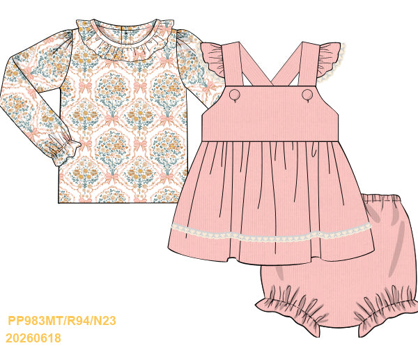 Children's clothing set with floral top and pink dress on a white background