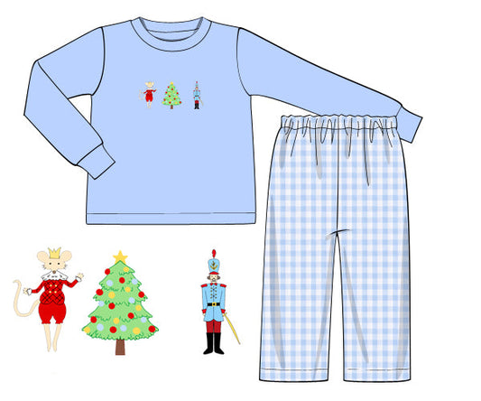 Children's Christmas-themed pajama set with blue long-sleeve top and checkered pants on a white background.