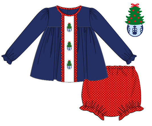 Children's blue dress with red polka dot trim and matching skirt on a white background