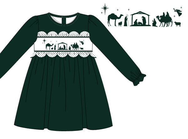 Green dress with nativity scene design on a white background