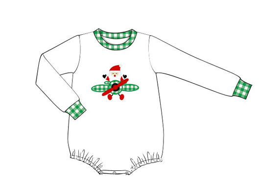 White sweater with green checkered trim and a Santa Claus design on a white background