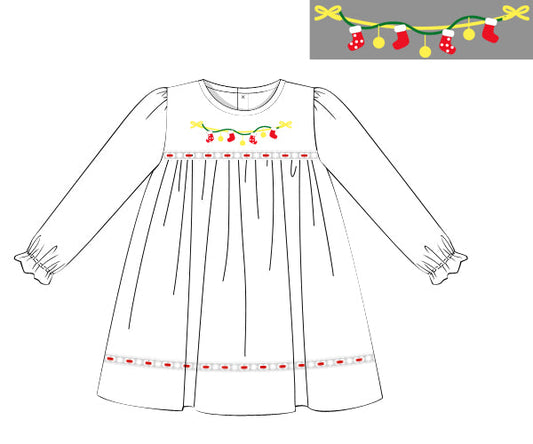 Children's dress design with embroidery on a plain background
